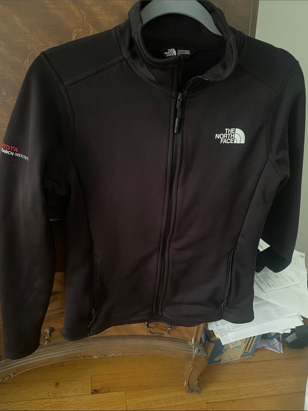 The North Face Black Full-Zip Jacket with Logo. Never worn.